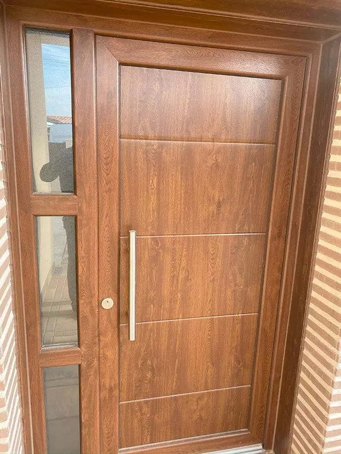 Instalaci&oacute;n Ventanas y Puerta de Entrada PVC color Roble en Madrid